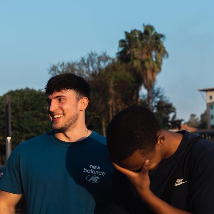 Avery Chen, Lead Design Curator at WhisperGladeField, reviewing corporate floral arrangements